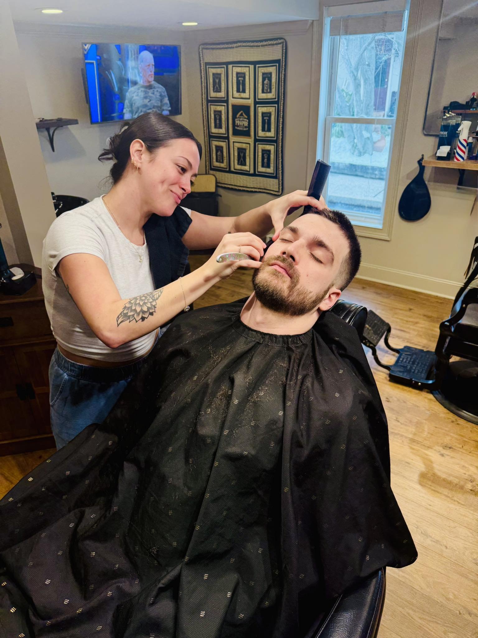Jenna giving a straight razor shave