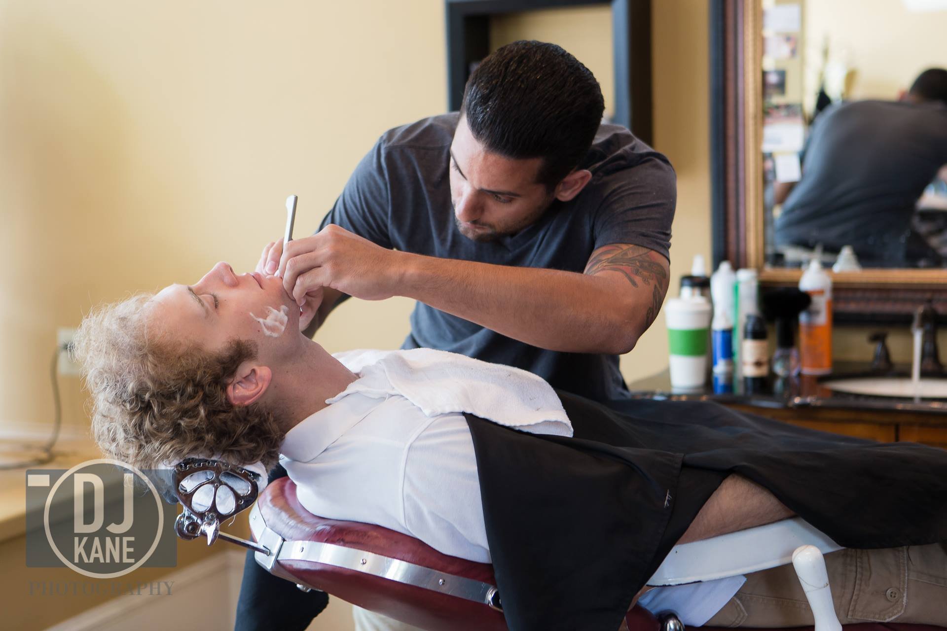 Straight razor shave in progress