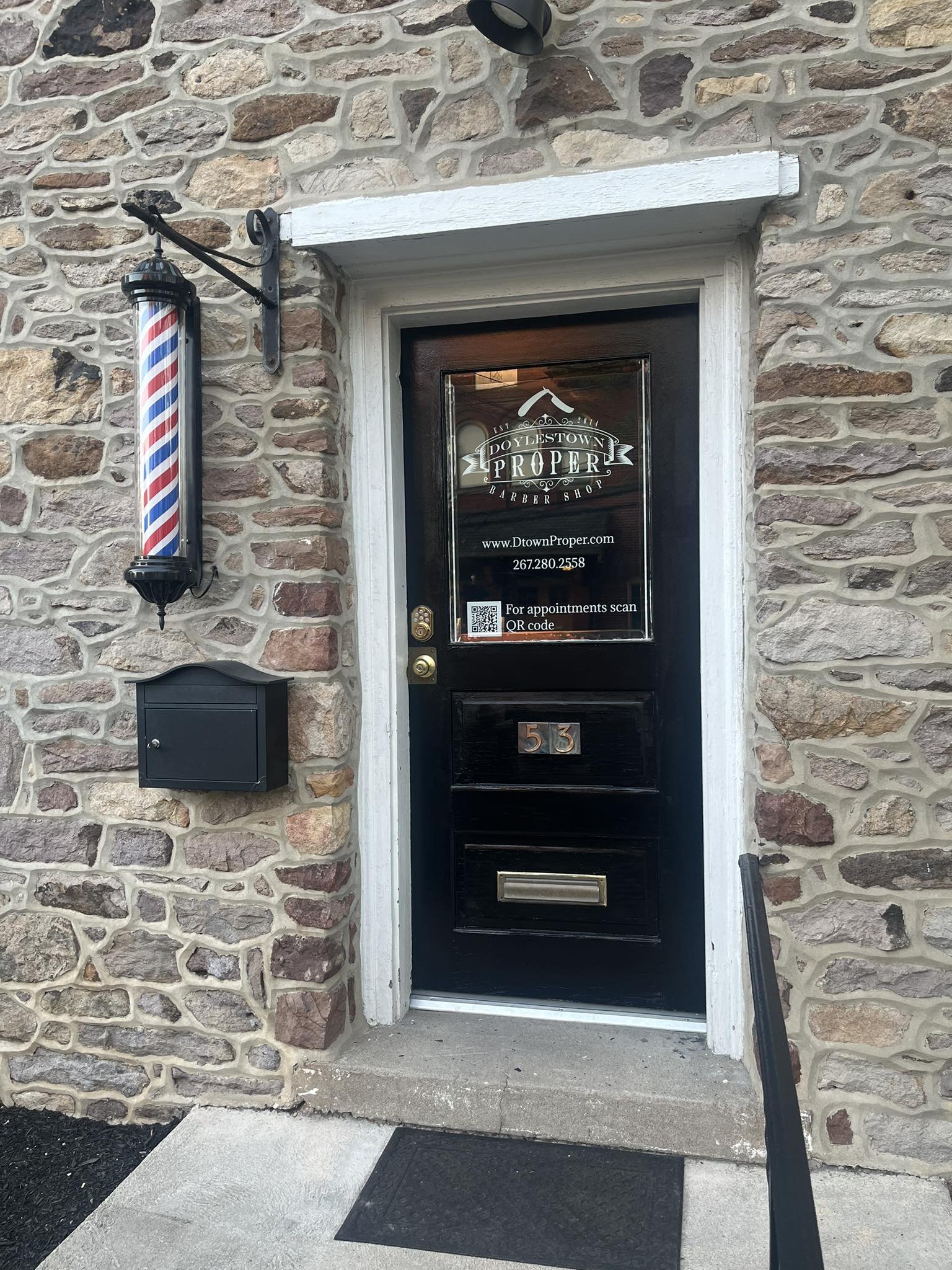 Doylestown Proper Barbershop storefront on East Oakland Avenue